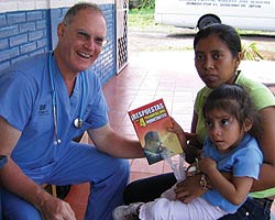 Dr. Hammond with a mother and child in Nicaragura